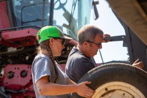 Erin Bailey and her father Mark Bailey working on equipment on their farm in eastern Washington state as part of the Stories of Stewardship campaign.