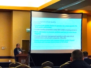 Image shows Steve Wirsching, USW, discussing wheat quality improvement at the Wheat Quality Council meeting.