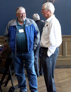 Reid Christopherson, Executive Director of the South Dakota Wheat Commission, and U.S. Wheat Associates (USW) Board Member Kent Lorens of Nebraska, chat during the Wheat Foods Council Board Meeting in Denver.