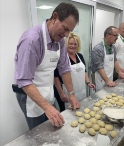 USW Past Chair Darin Padget and current Chair work together on a baking assignment during the Core Competency Training in Santiago.