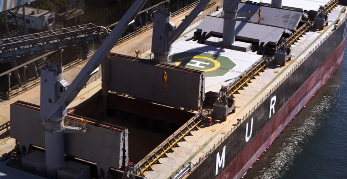 U.S. wheat loading on a bulk vessel for export to illustrate export market development concept.