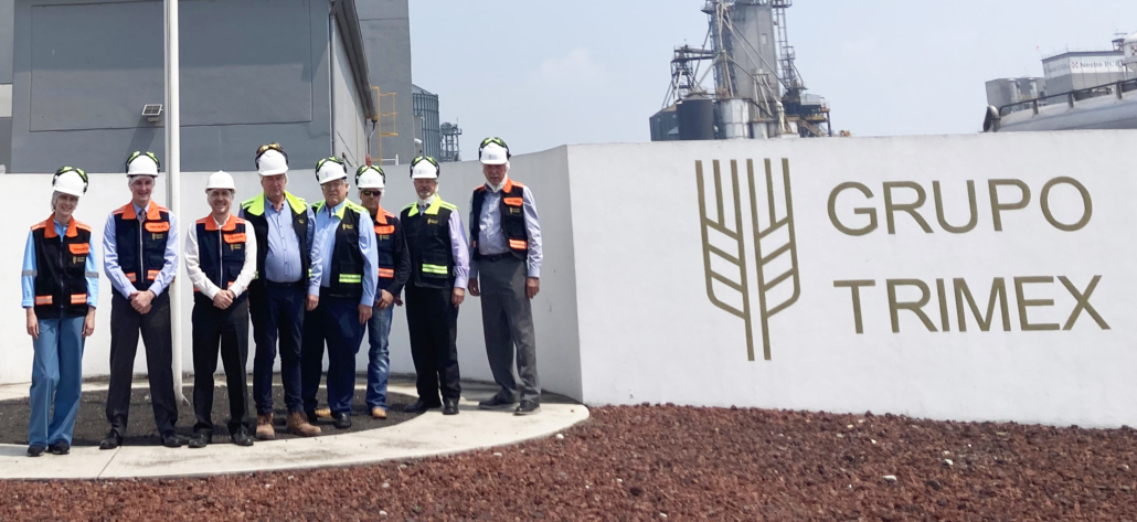 USW's Latin America Board Team poses for a photo in front of a Grupo Trimex Facility in Mexico following a tour and discussions about U.S. wheat