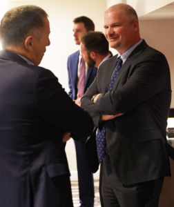 Ian Flagg, USW Regional Vice President for European, Middle Eastern and North African Regions, right, greets a member of the delegation of European flour millers during meetings in Washington, D.C.