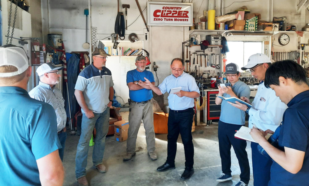 A trade team made up of members of the Japan Flour Millers Association visited Montana farmer Ed Bandel and his son, Jess, in October 2023. USW Japan Country Director Rick Nakano (shown here sharing information with the team) led that trade team.