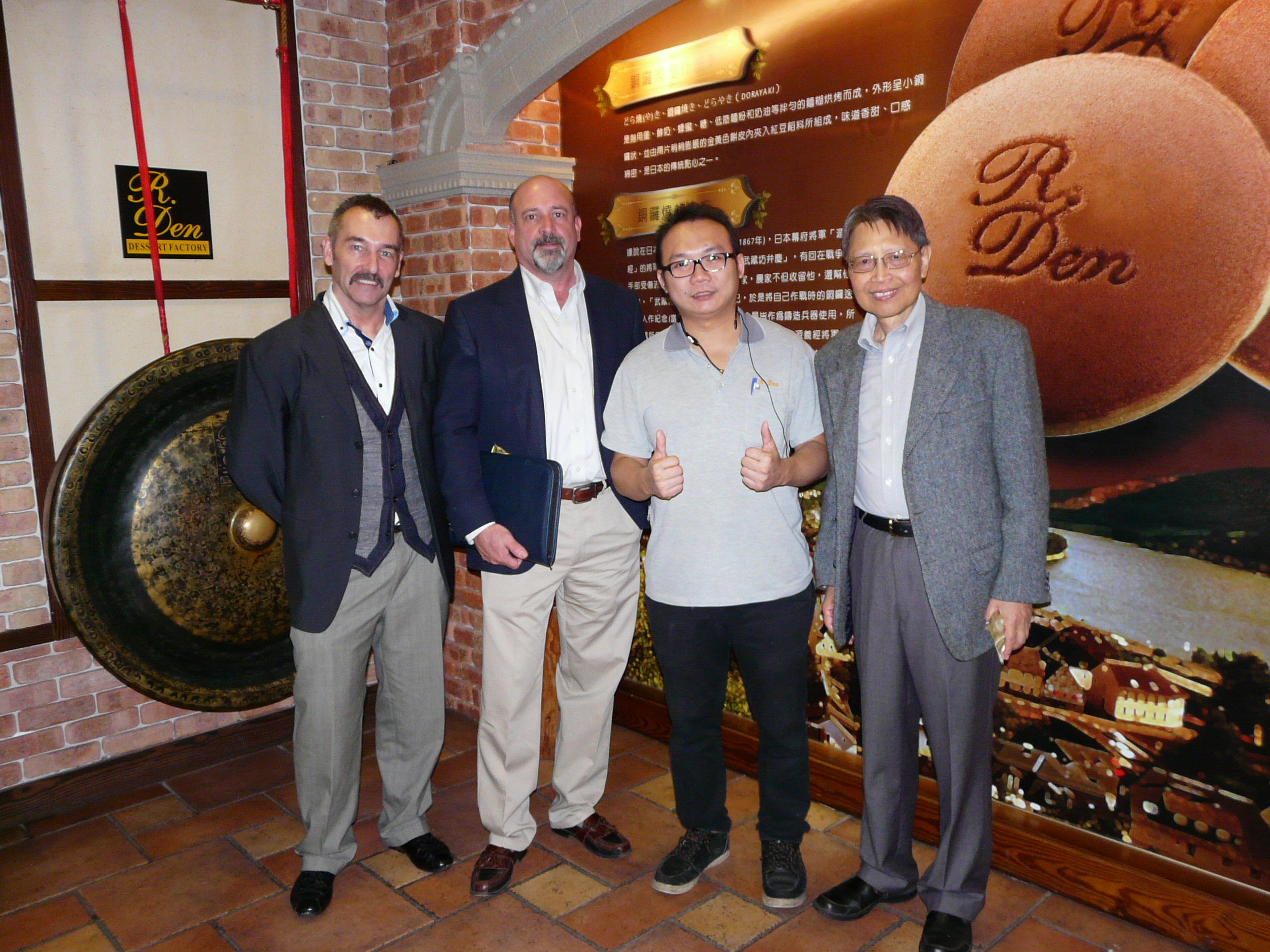 Ron Lu with USW colleagues and the owner of R Den Dessert Factory