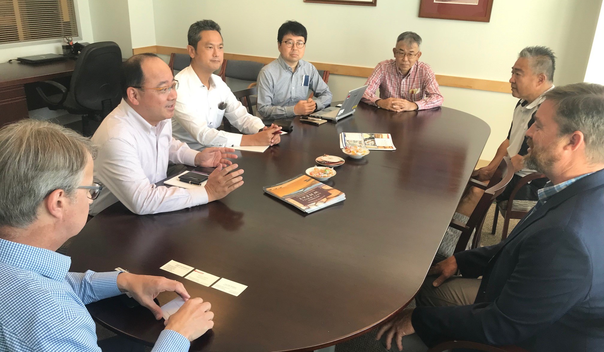 Image shows representatives of U.S. Wheat Associates, the Wheat Marketing Center and Japanese flour millers during a trade teams visit to exchange U.S. club wheat information.