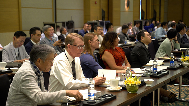 Oregon wheat farmer David Brewer (second from left) listens to speakers at the North Asia Marketing Conference.