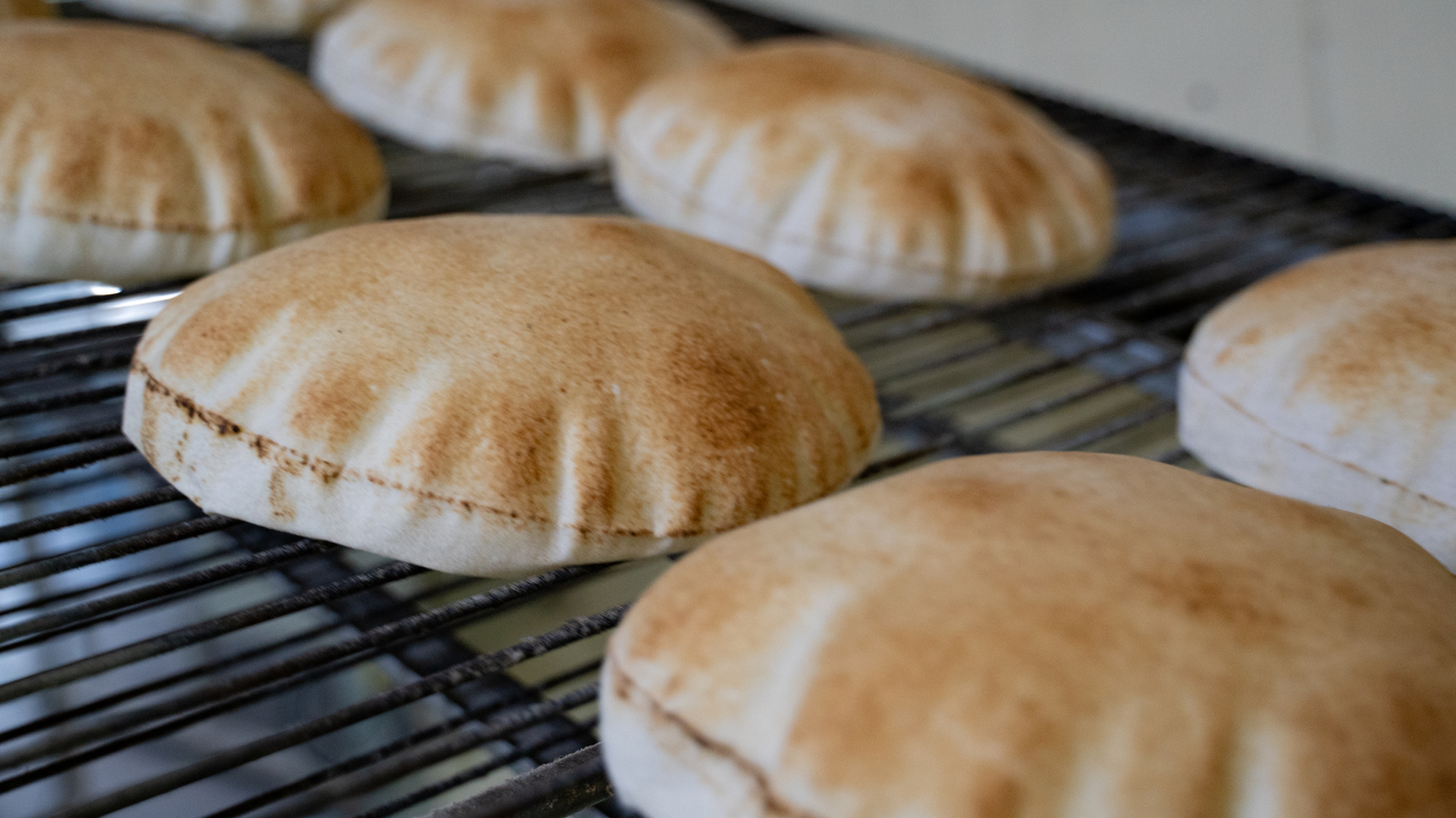 Arabic bread symbolizing increased trade in Middle East after lower global wheat production.