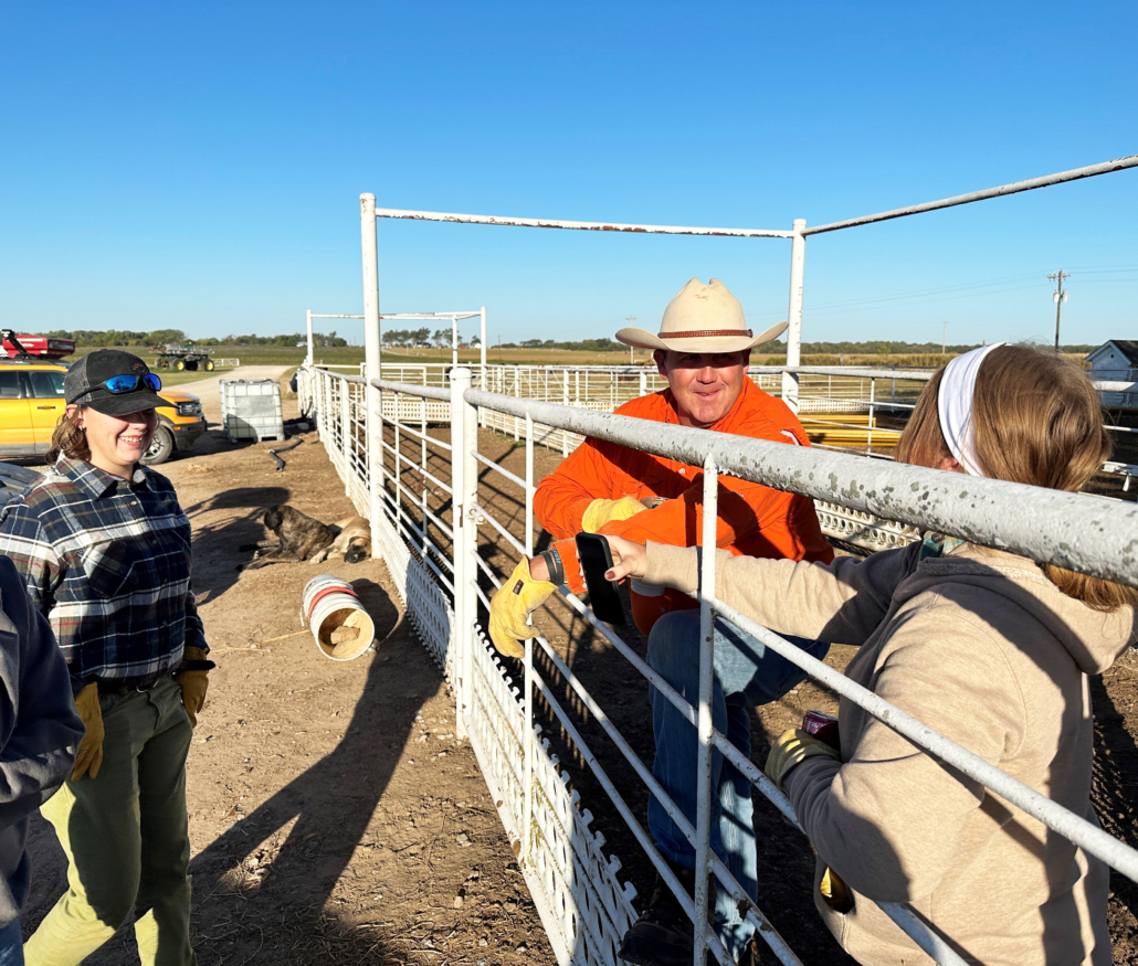 Tom Cannon prepares to work cattle with his daughters Raegen, right, and Rachel, left.