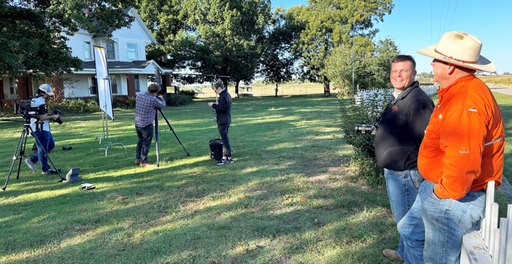 Tom Cannon chats with Oklahoma Wheat Commission Executive Director Mike Schulte as he waits for the video crew to interview him for USW’s Stories of Stewardship series